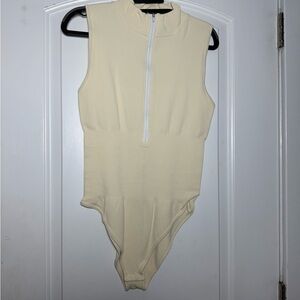 Elegant Cream Sleeveless Bodysuit